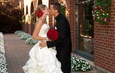 The Inn at St. John's Plymouth, MI - Bride & Groom kissing in Garden2
