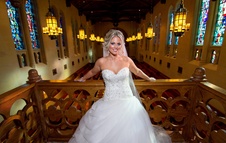 The Inn at St. John's Plymouth, MI - Bride Posing in Bridal Suite overlooking Chapel